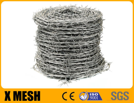 Galvanized Barbed Wire Dengan Empat Barb Tipe Reverse Twist Tensile Tinggi Untuk Keamanan iter